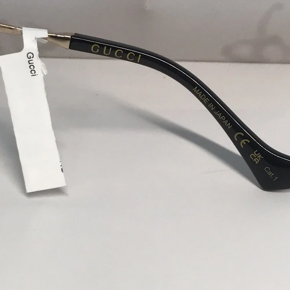 New Authentic GG1096S 003 Sunglasses by Gucci™ Shield, Material: Metal, Rimless.